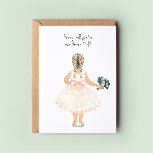A personalised &#39;Thank You For Being My Flower Girl/Junior Bridesmaid&#39; card with customisable options for dress, skin tone, hairstyle, and text for the junior bridesmaid or flower girl.